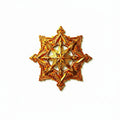 Decorative gold star on a white background